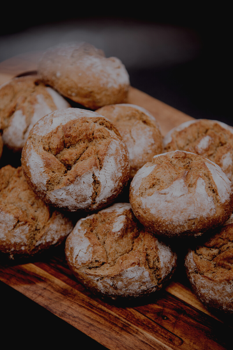 Freshly Baked Bread on Wooden Board